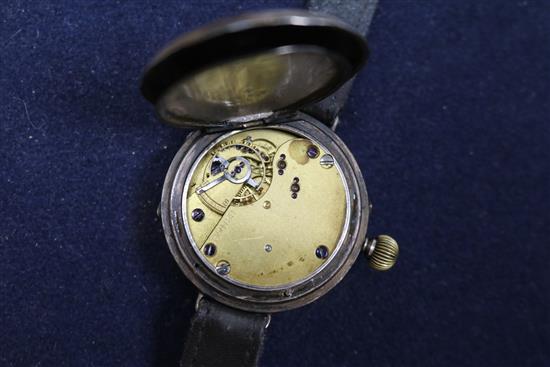 A gentlemans early 20th century silver half hunter wrist watch.